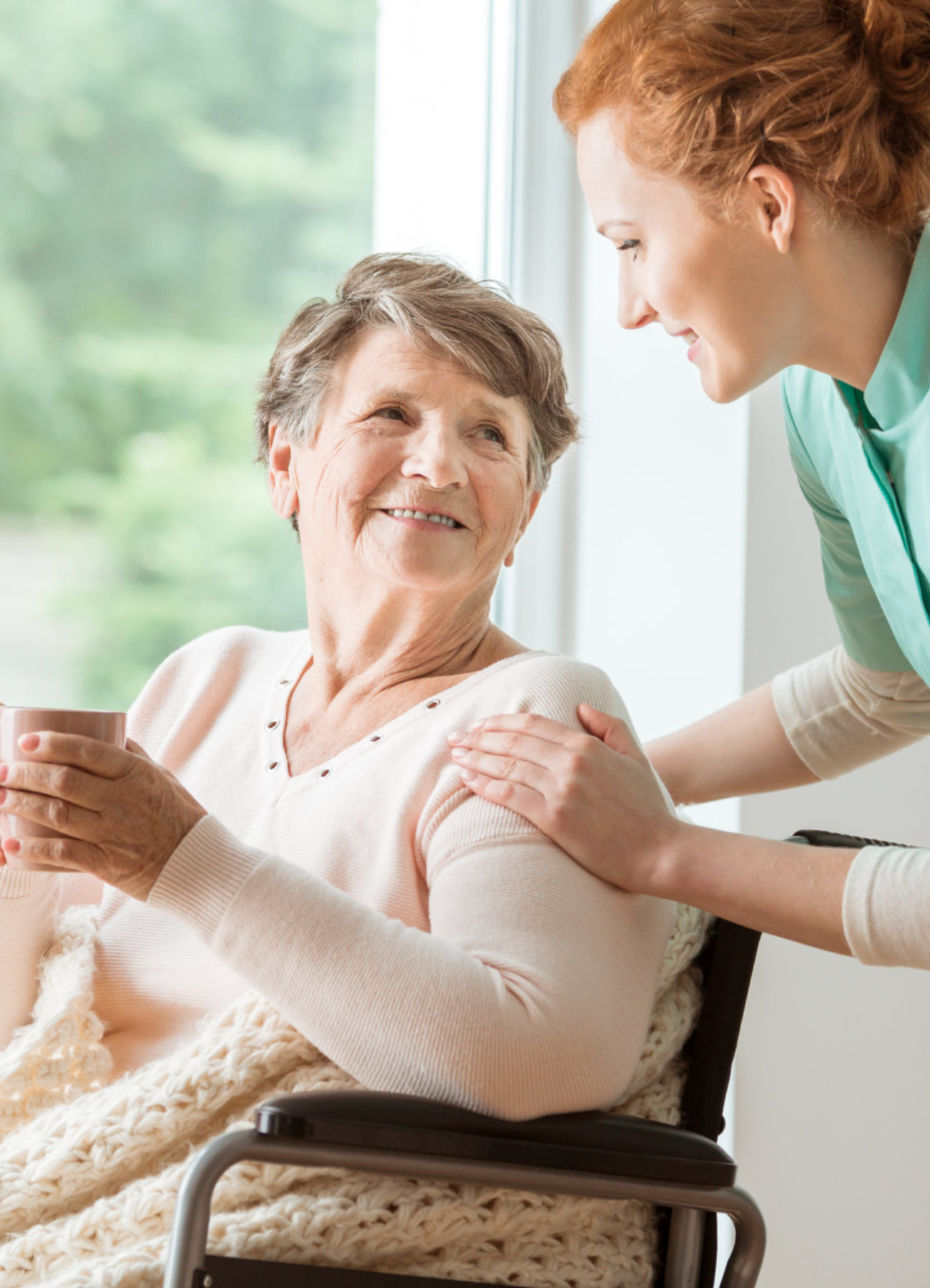 woman and elderly smiling