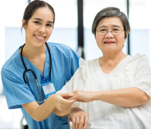 elderly woman with caregiver